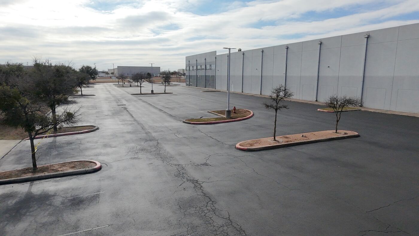 Fresh striping on a large commercial warehouse parking lot