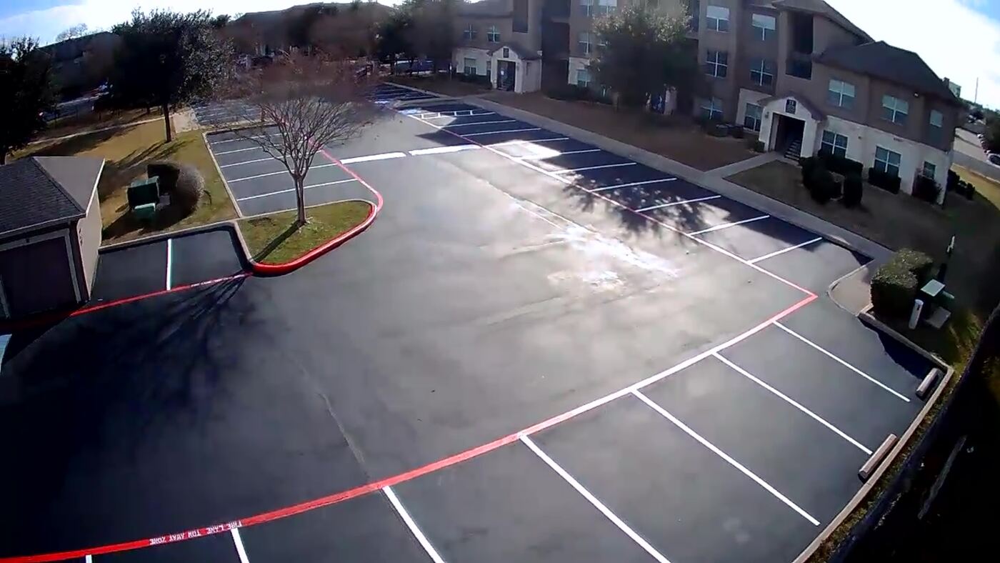 Aerial view of fire lane curb and full restripe at apartment complex